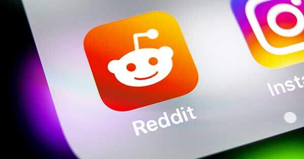 Reddit app icon on phone - featured image for digital publisher reddit threads article